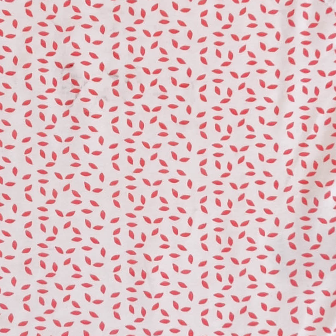 RED PATTERNED SLEEVLESS ONESIE