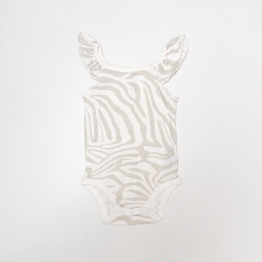 CREAM PATTERNED RUFFLE ONESIE