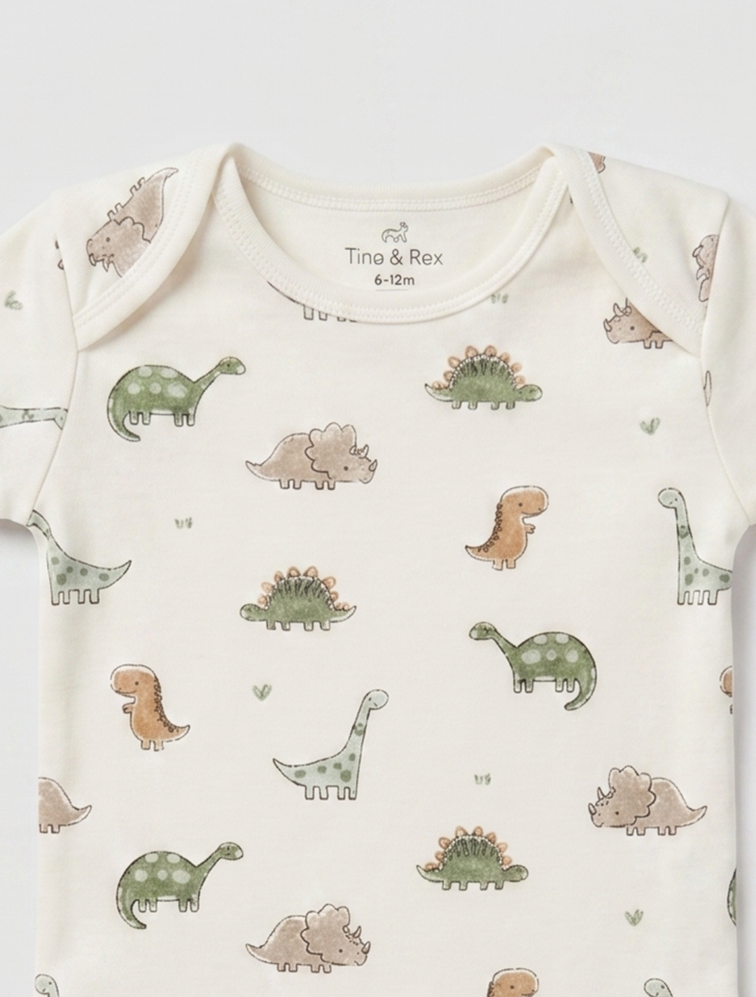 DINO PRINTED ONESIE