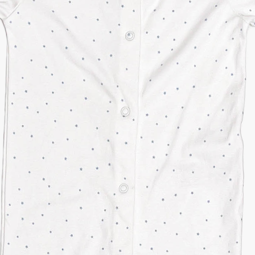 WHITE STAR PRINTED SLEEPSUIT