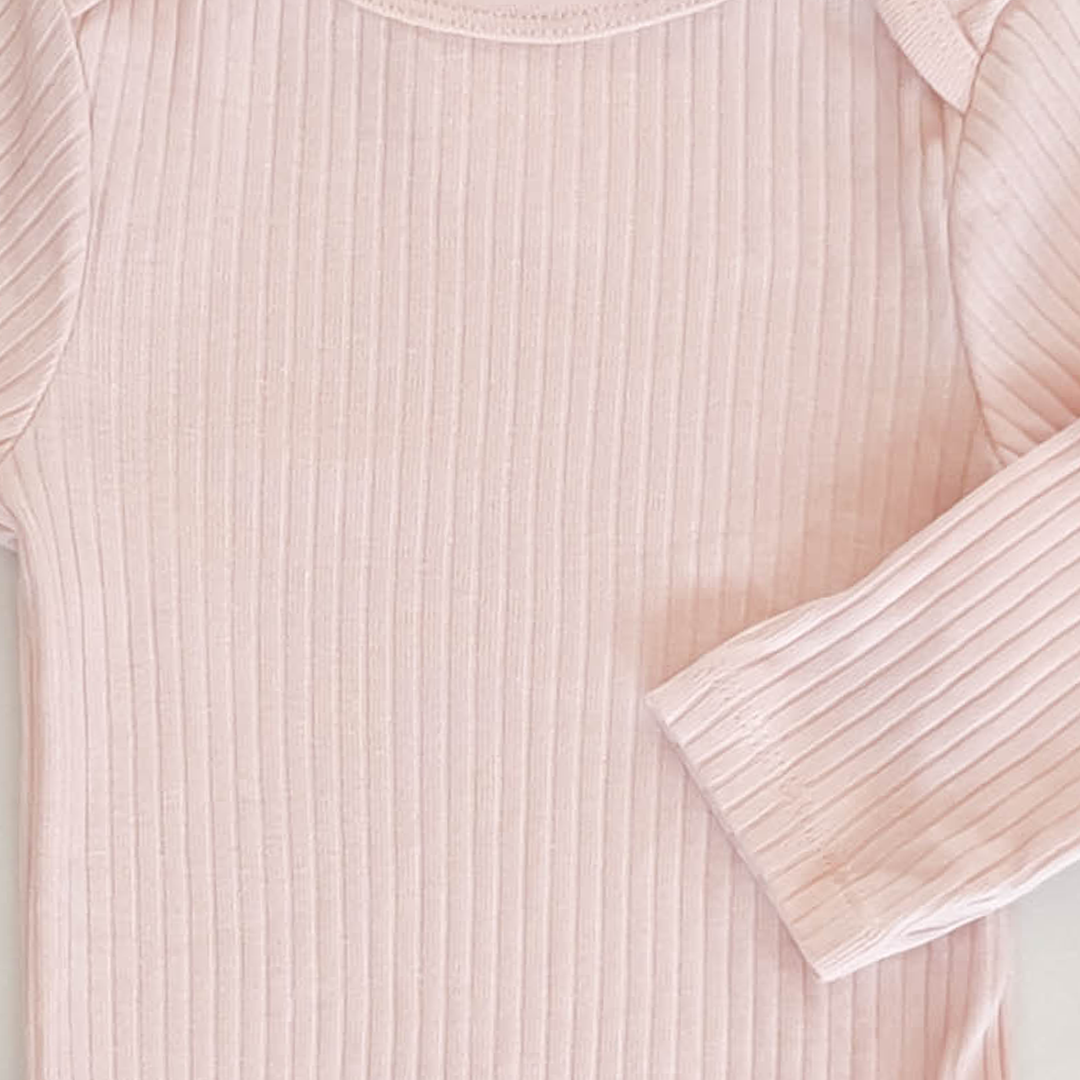 CREAMY PEACH RIBBED ONESIE