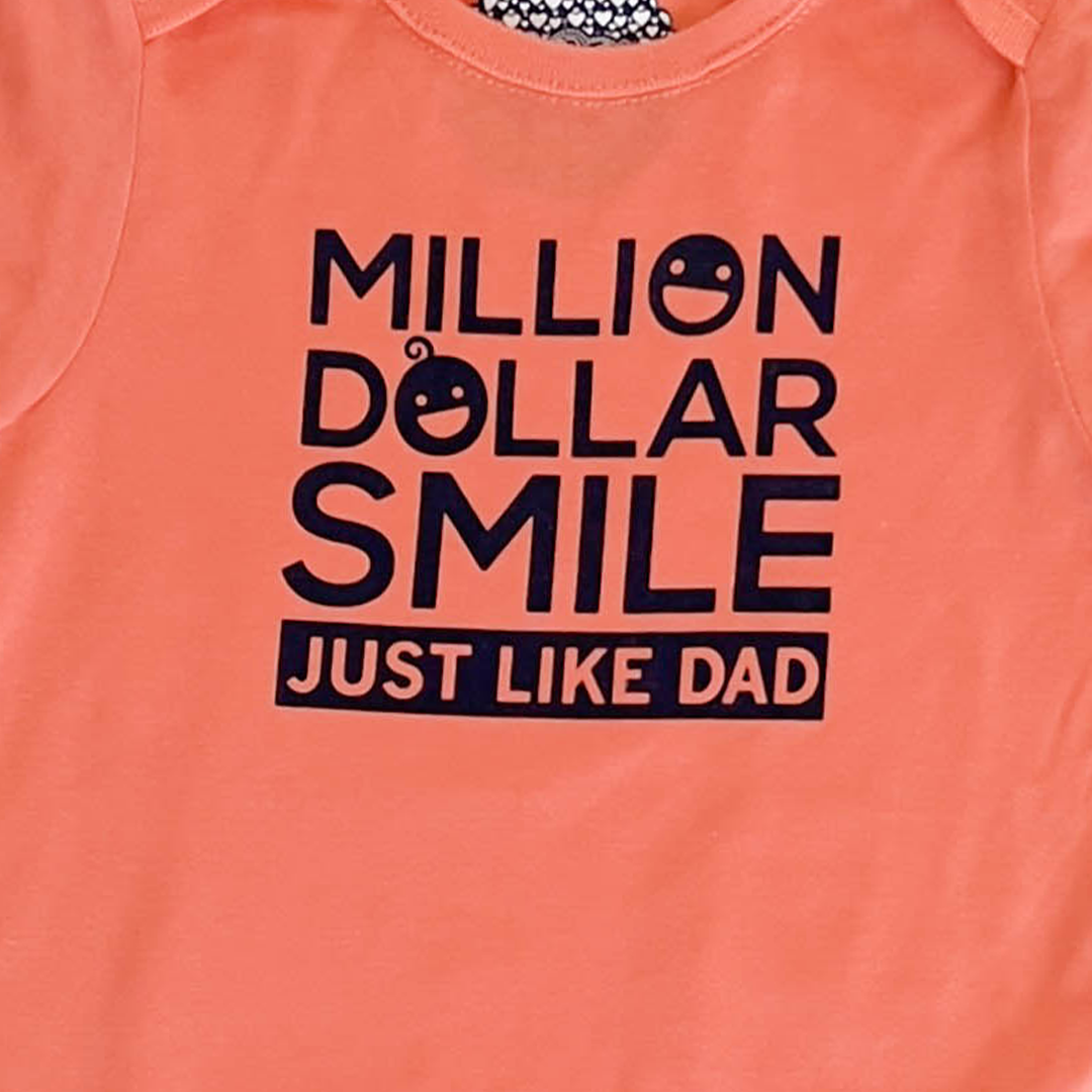 ORANGE PRINTED ONESIE