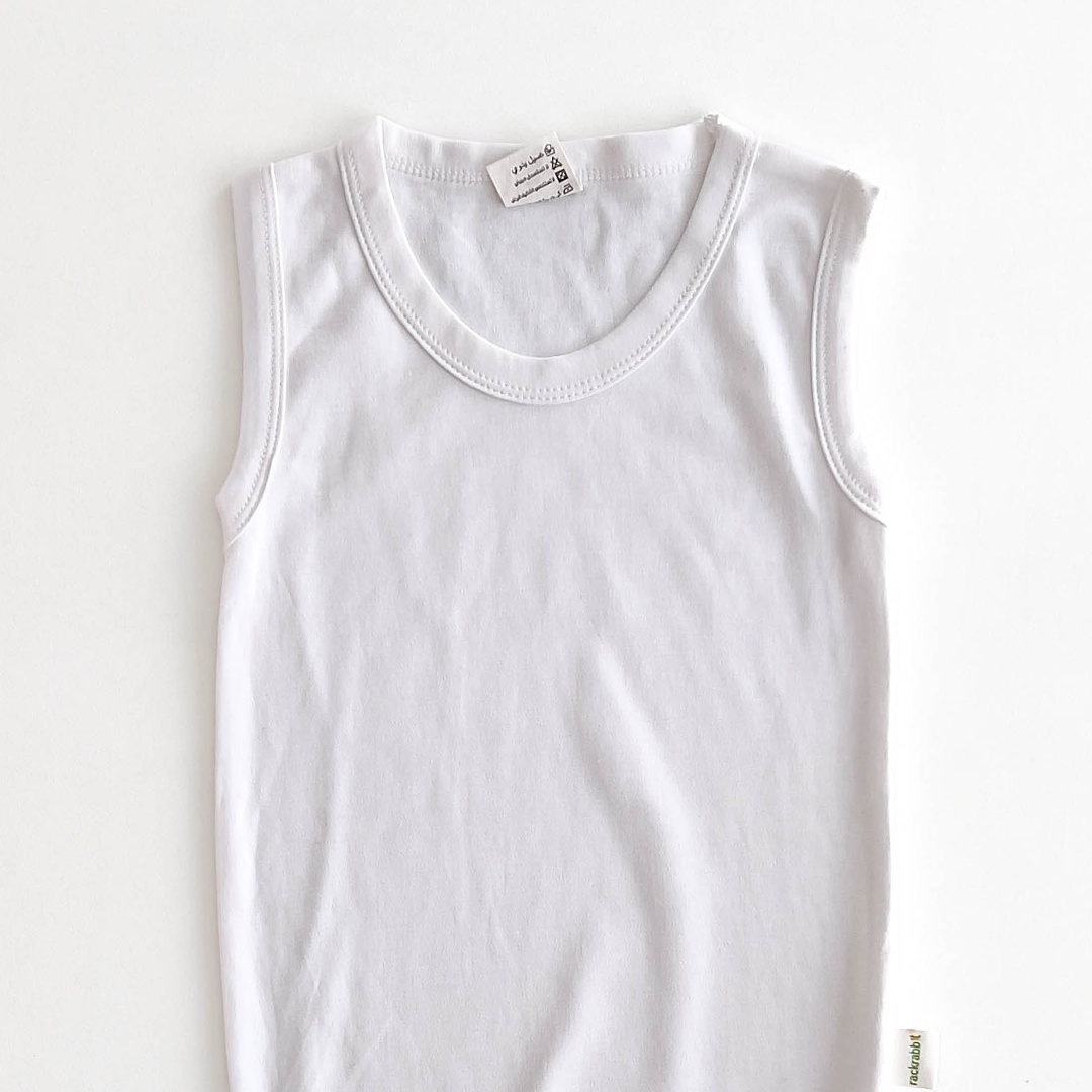 WHITE SLEEVELESS ONESIE