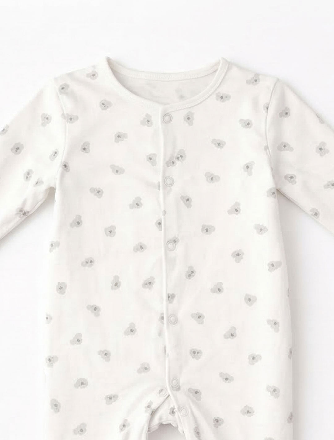 ANIMAL PRINTED WHITE SLEEPSUIT