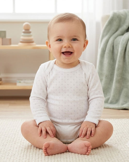 White pointelle full sleeve onesie