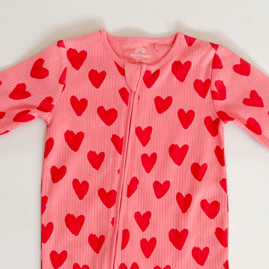 PINK AND RED LOVE PRINT RIBBED ROMPER