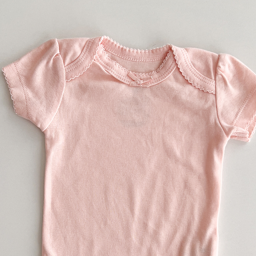 Peach pink colour onesie