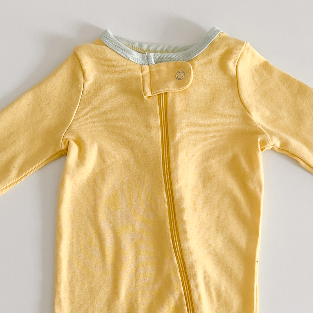 Butter yellow coloured sleepsuit