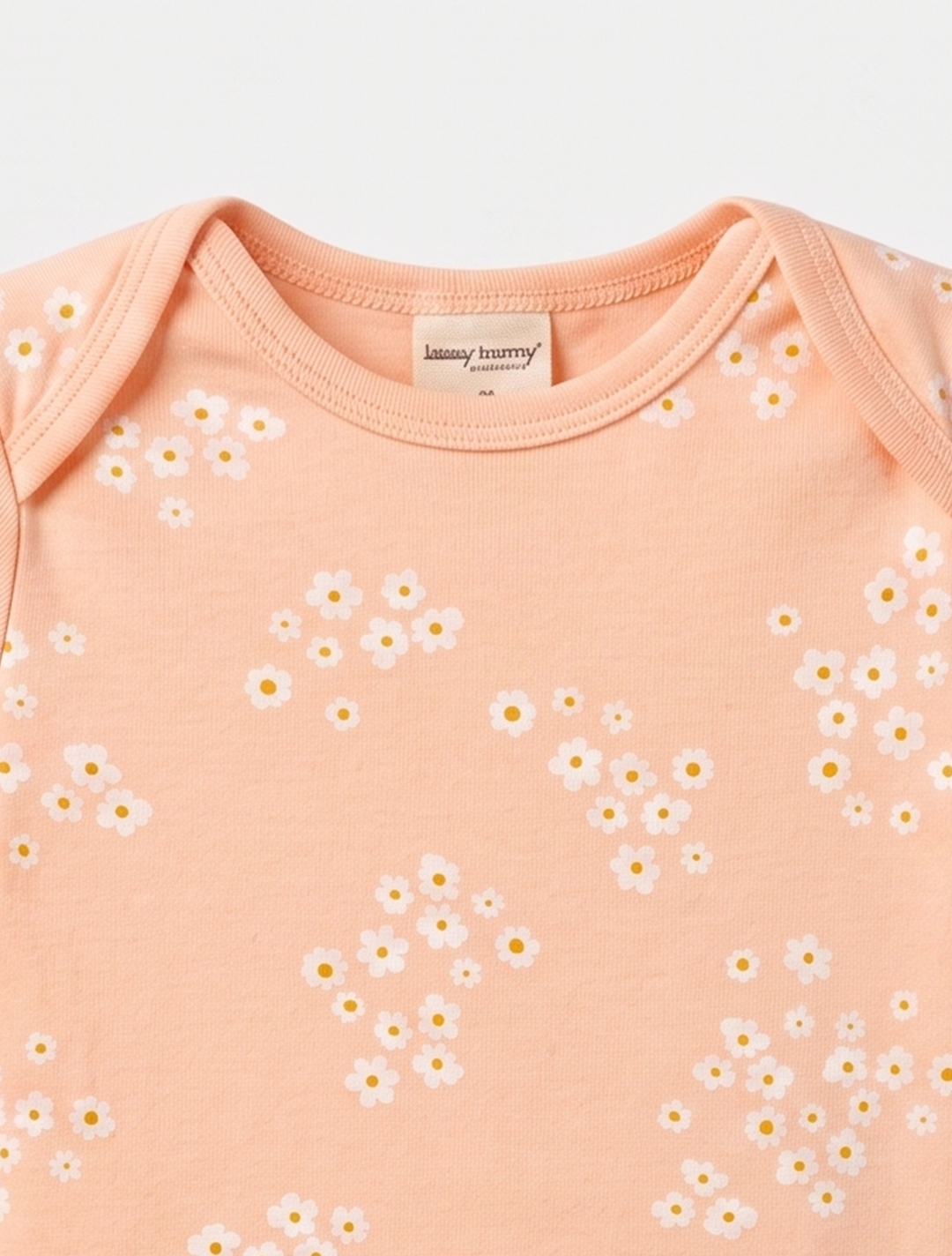 PEACH FLORAL PRINTED ONESIE