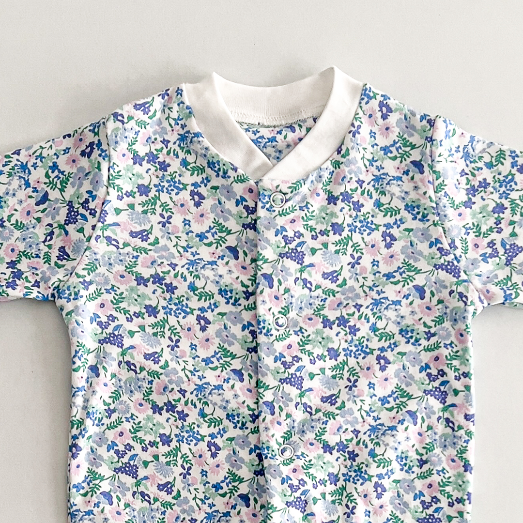 Purple and blue floral sleepsuit