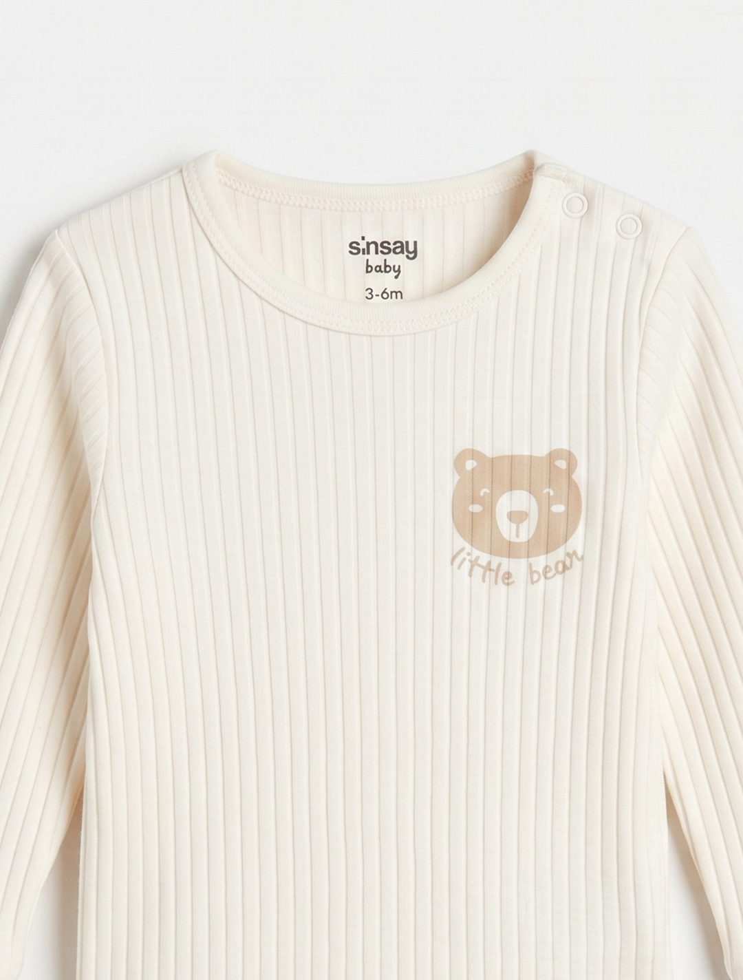 BEIGE RIBBED BEAR PRINTED ONESIES