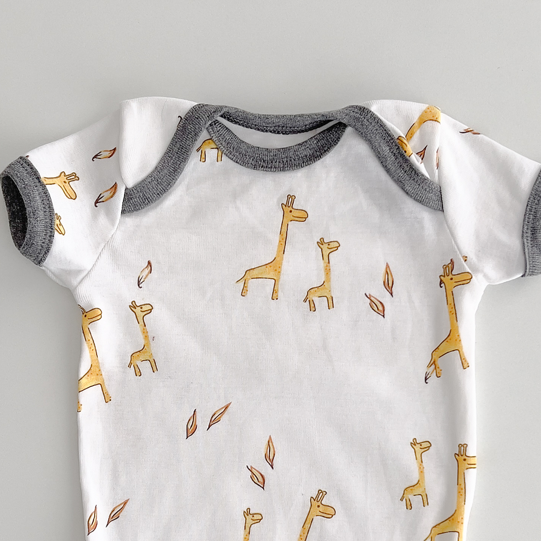 giraffe printed onesie