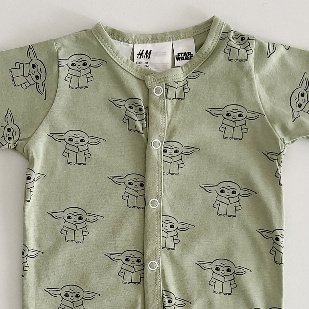 Sage green patterned sleepsuit