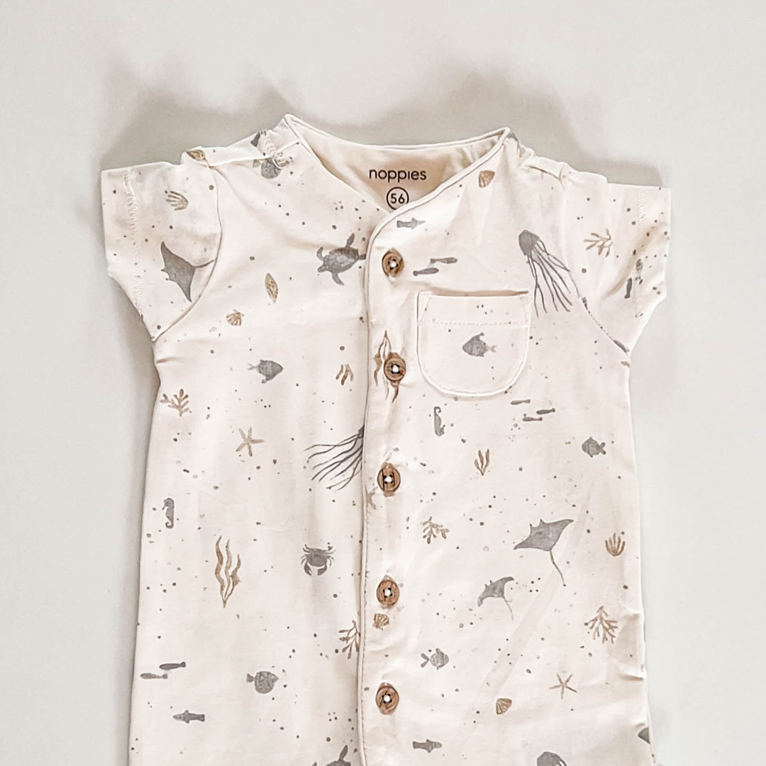 IVORY OCEAN PRINTED JUMPSUIT