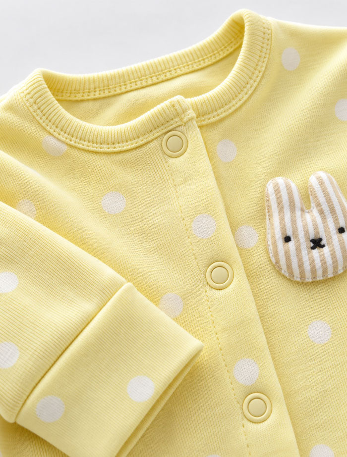 Yellow dotted button sleep suit