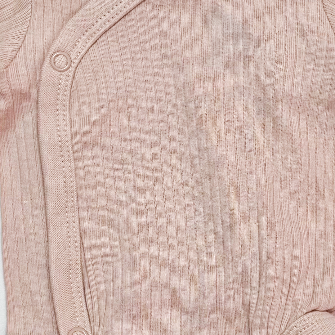 CREAM WRAPOVER RIBBED ONESIE