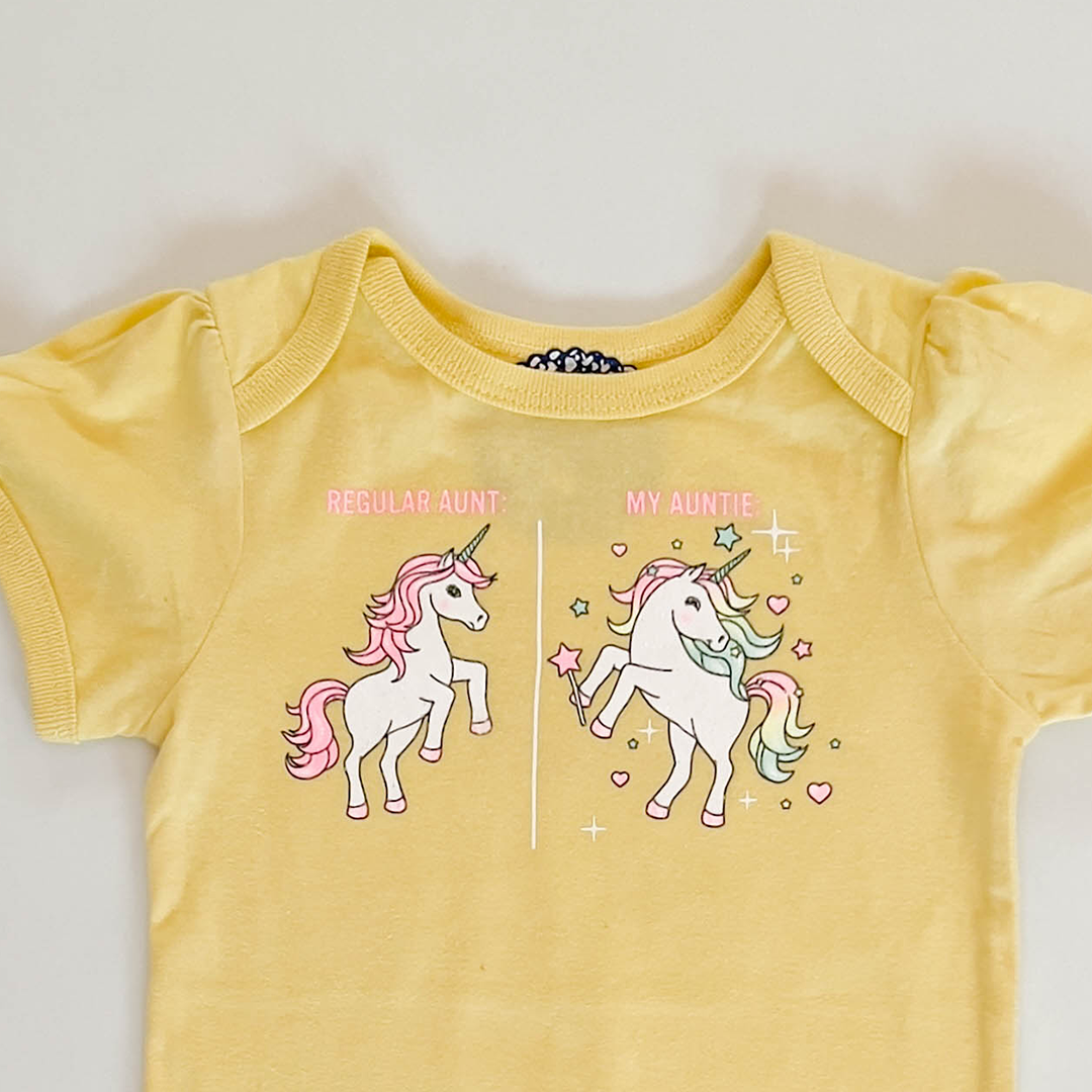 YELLOW UNICORN PRINT ONESIE