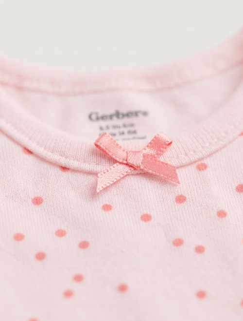 Pink polka dotted onesie