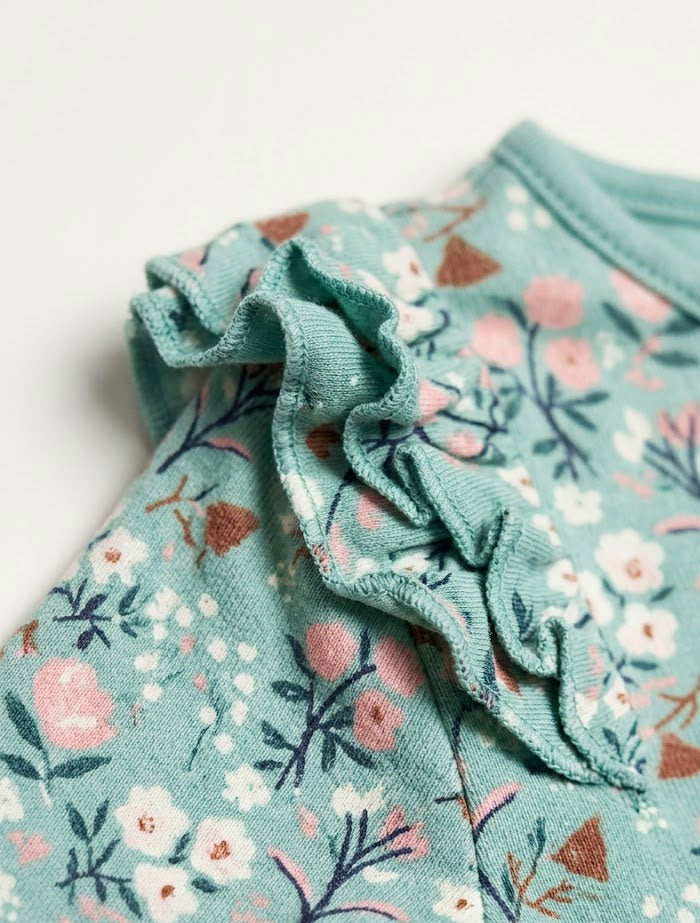 Green floral ruffled romper