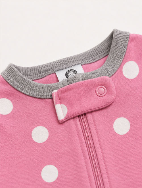 Pink polka dotted sleepsuit
