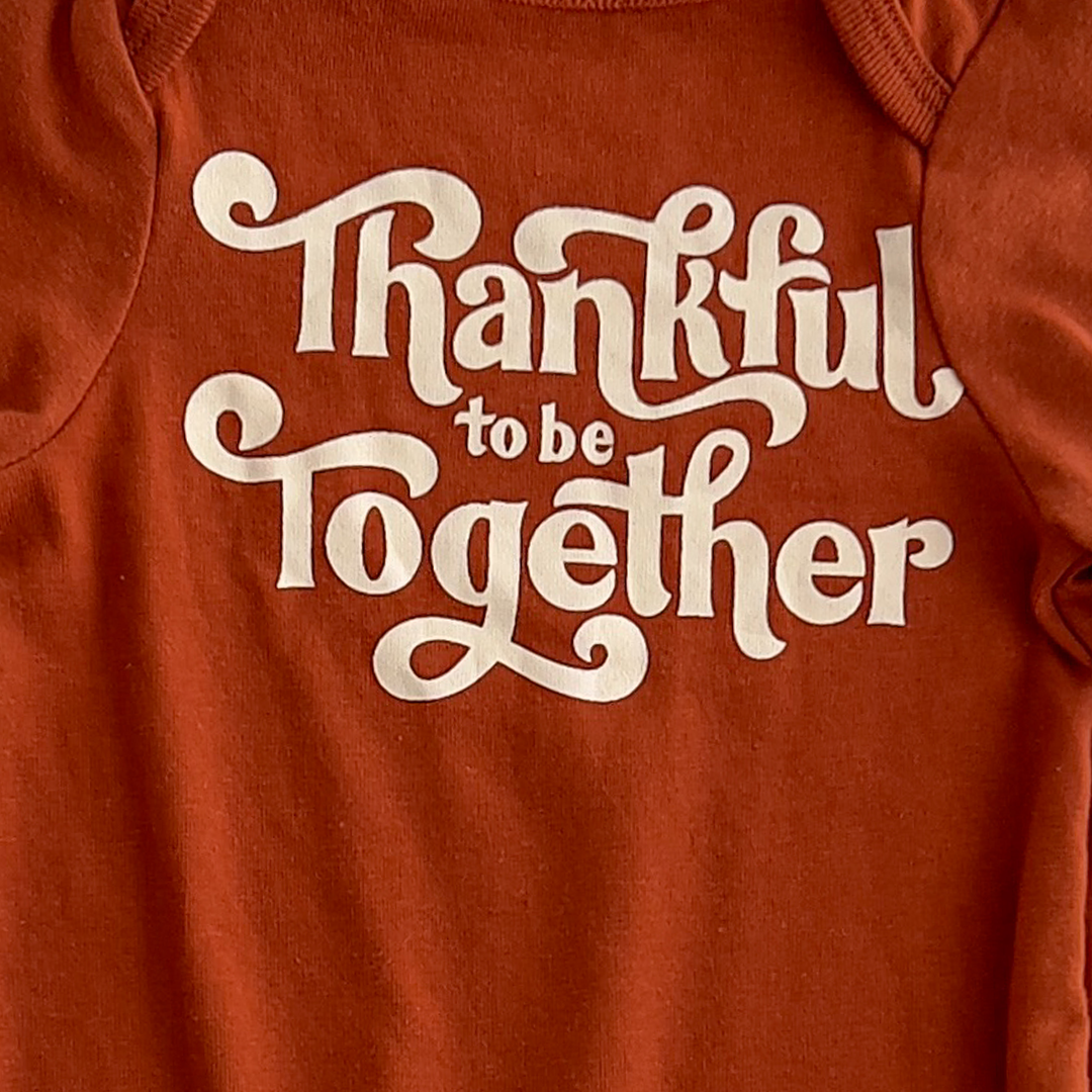 Rust colored printed romper