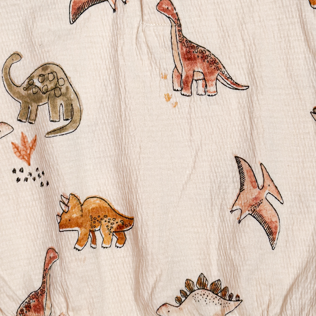 OFF WHITE DINO PRINTED MUSLIN ONESIE