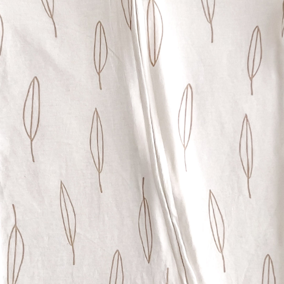 BEIGE AND WHITE LEAF PRINT SLEEPSUIT