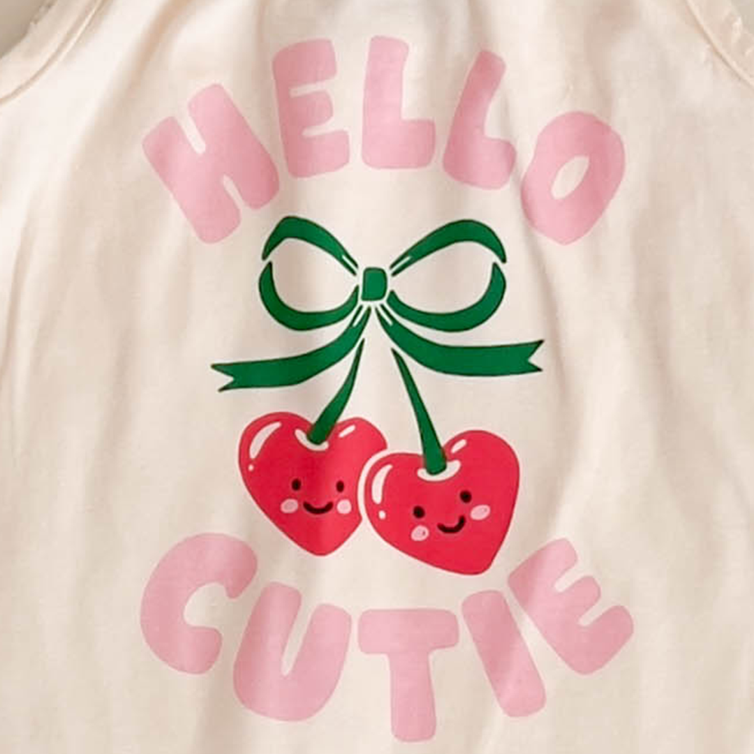 IVORY HELLO CUTIE PRINTED JUMPSUIT