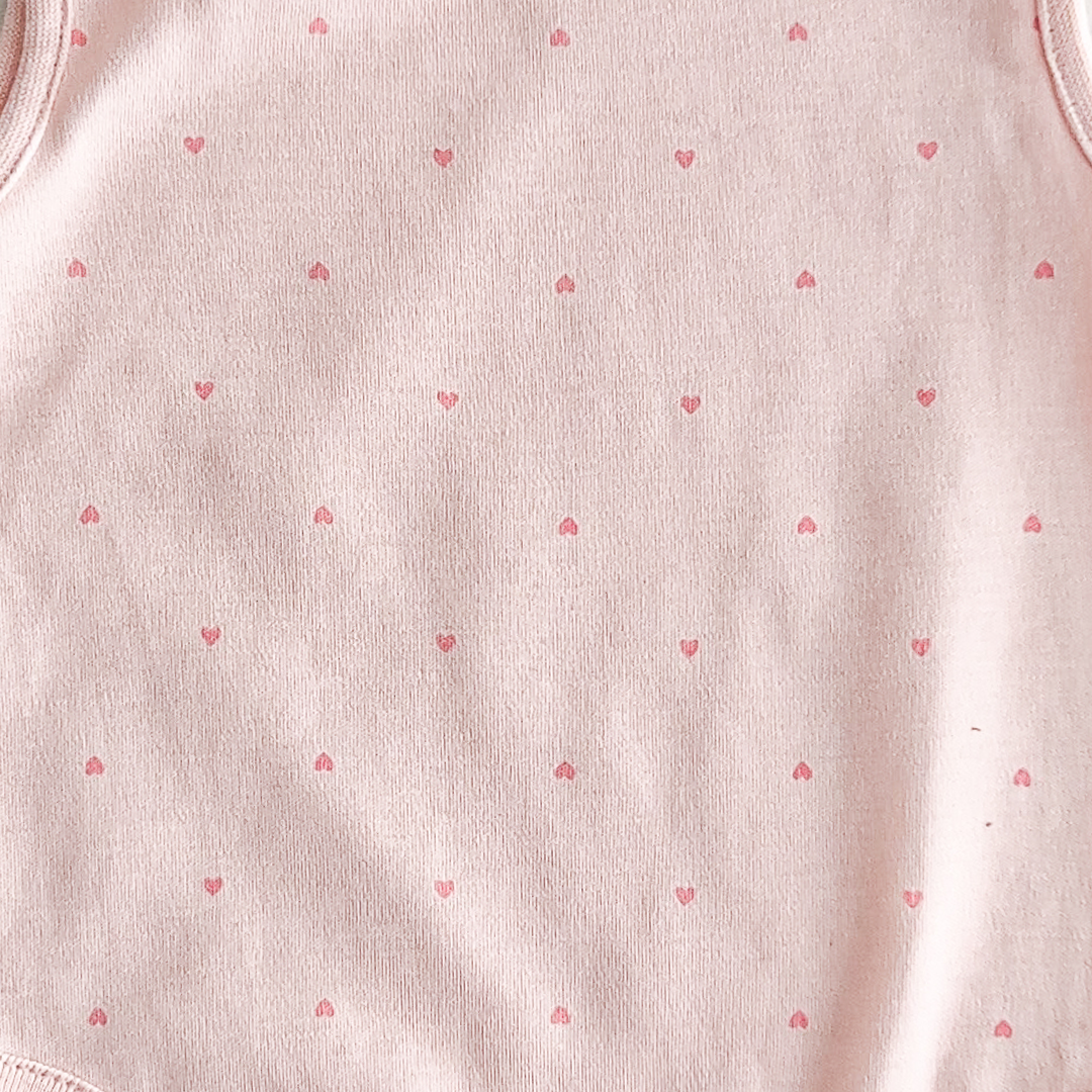 SLEEVLESS LOVE PRINT ONESIE