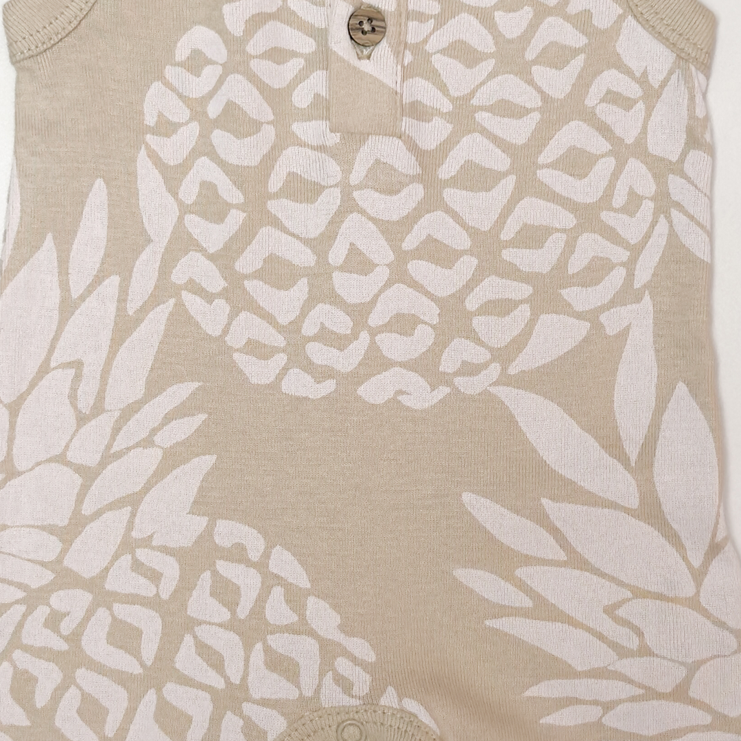 CREAM PRINTED SLEEVELESS JUMPSUIT