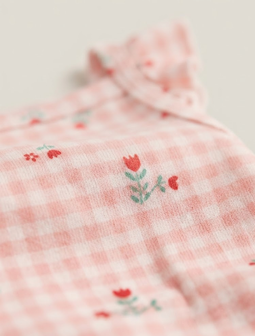 Pink floral check onesie