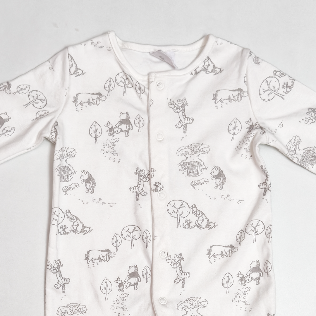 WHITE PRINTED BUTTON SLEEPSUIT