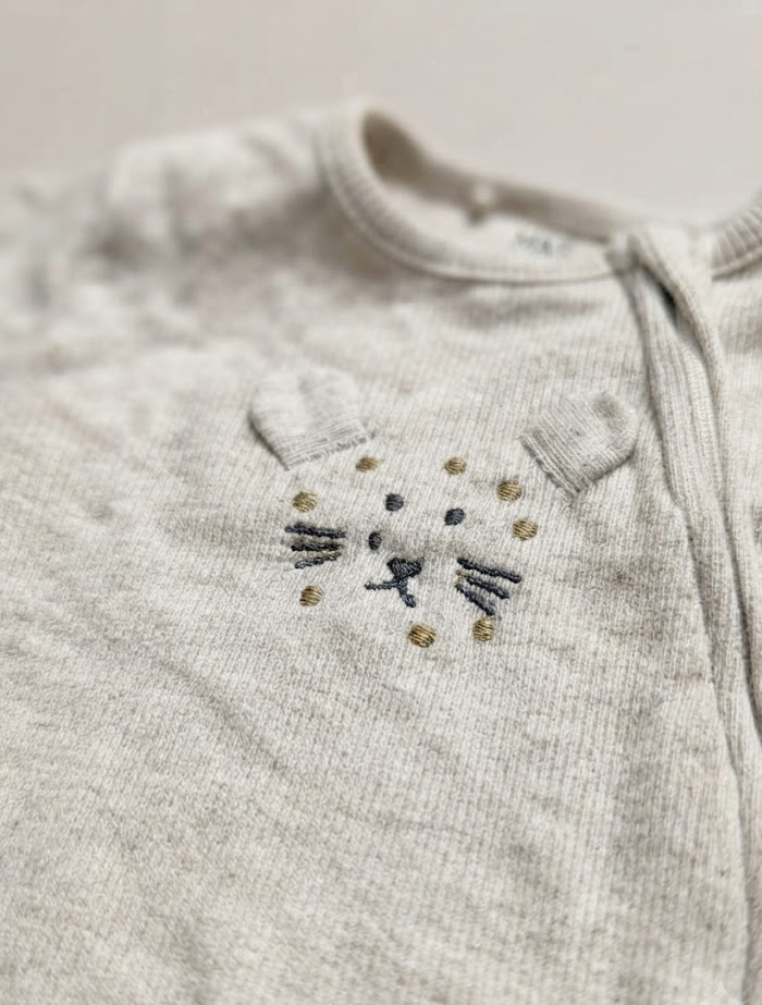 Cream lion zipper ribbed sleep suit
