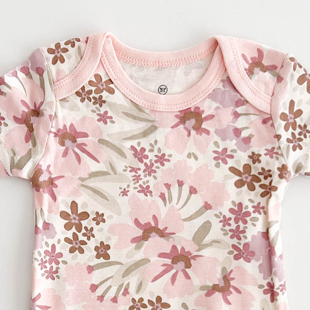 PASTEL PINK FLORAL ONESIE