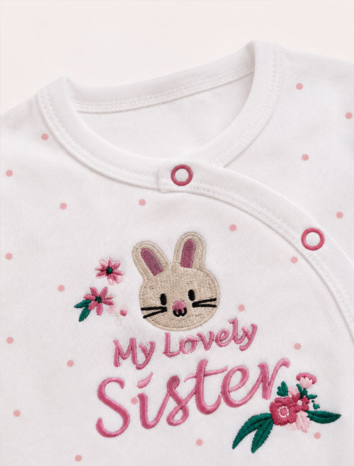 Pink polka wrapover sleepsuit