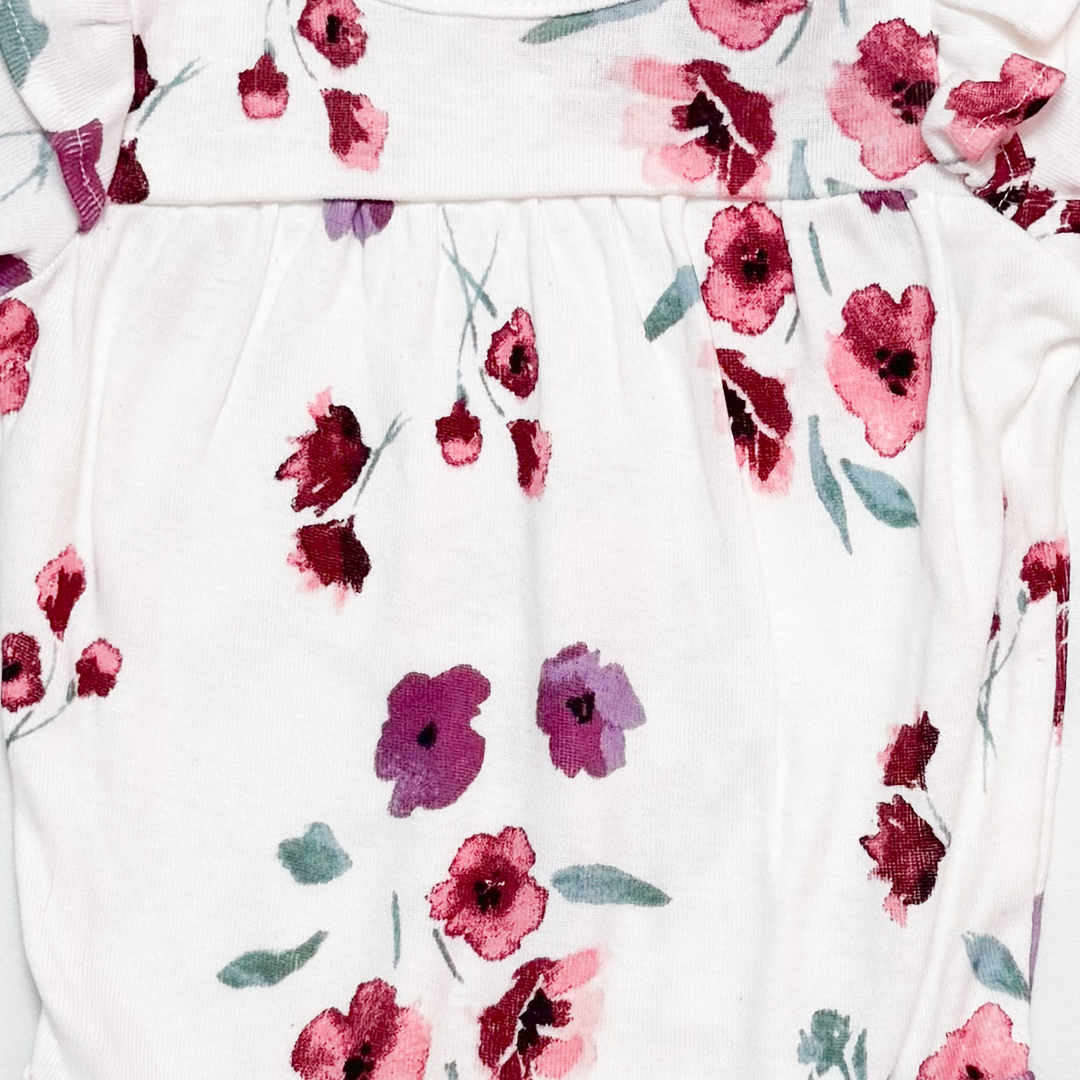 WHITE FLORAL RUFFLED ONESIE