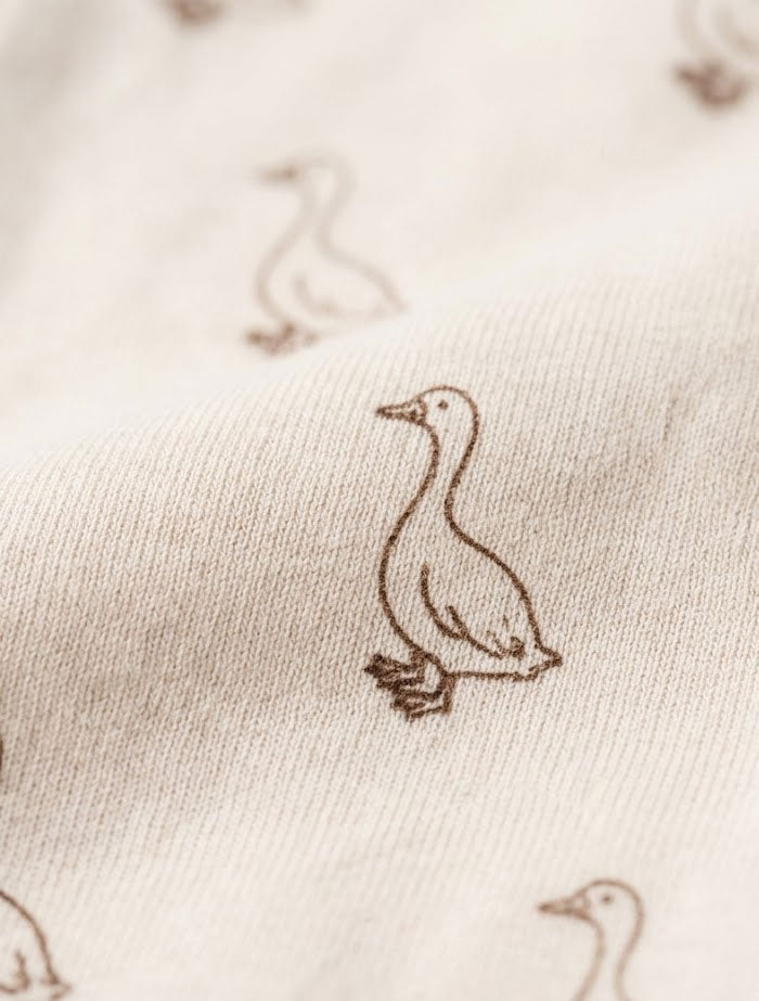 Beige duck printed 2 way zipper sleepsuit