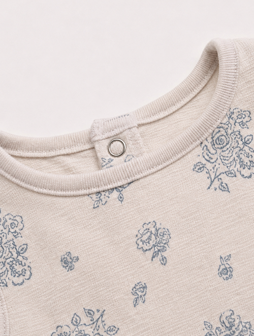 Blue floral patterned onesie