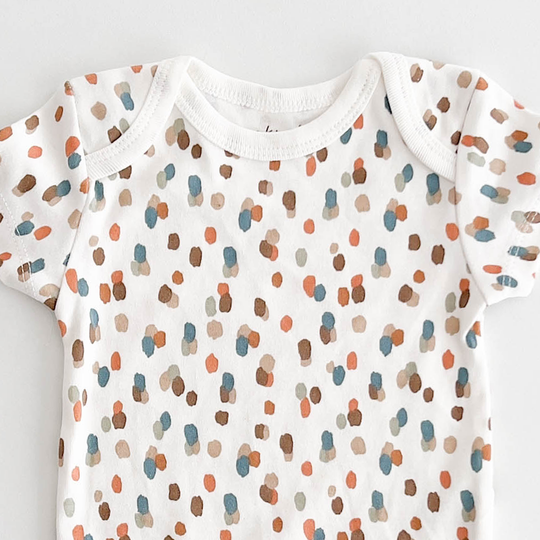 WHITE PATTERNED COTTON ONESIE