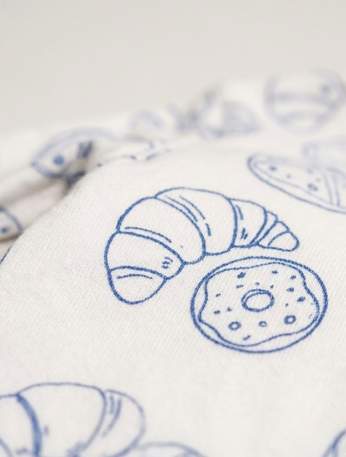 White and blue printed button sleepsuit