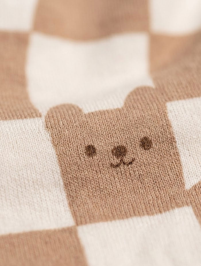 Brown beige check wrap over sleepsuit