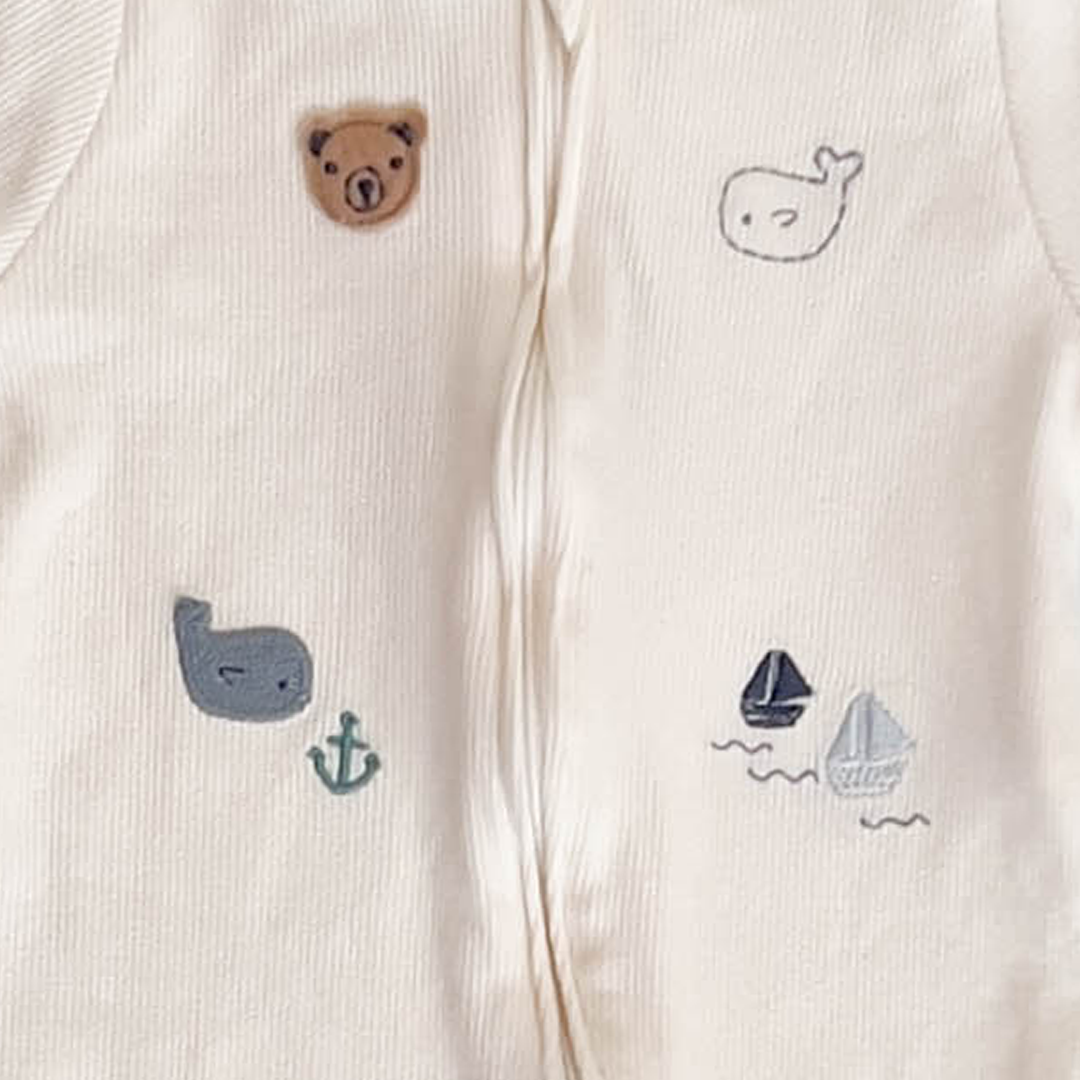 WHITE PATTERNED RIBBED ZIPPER ROMPER