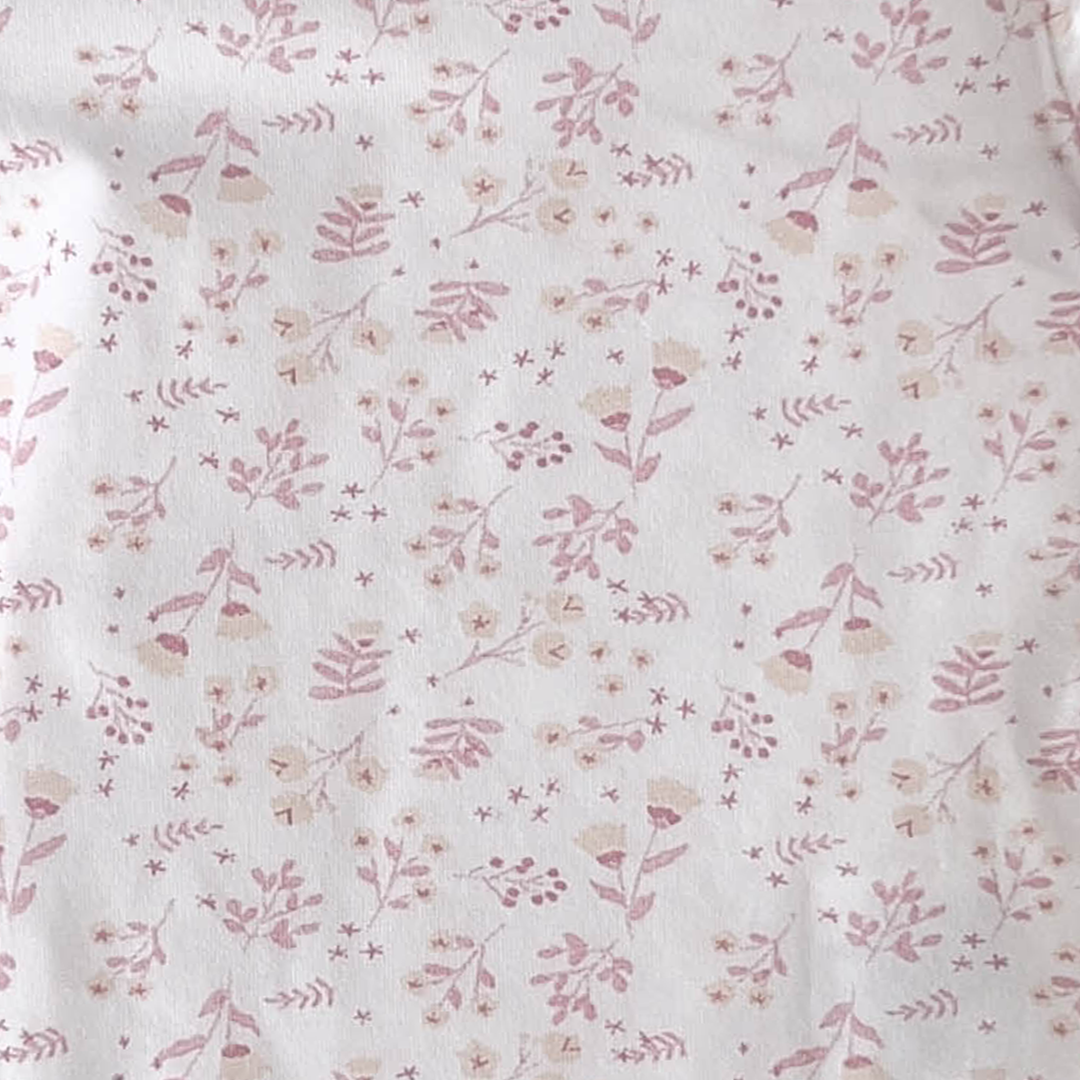 PINK FLORAL PATTERNED ONESIE