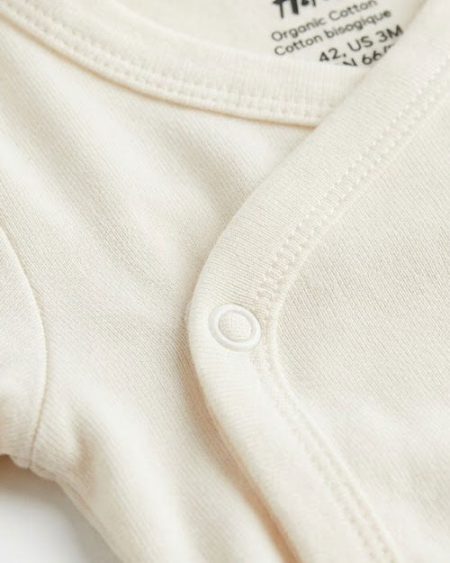 Off white wrapover onesie