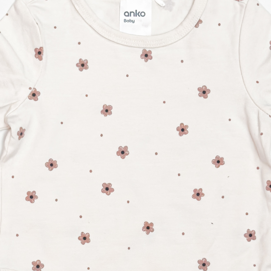 OFF WHITE FLORAL ONESIE