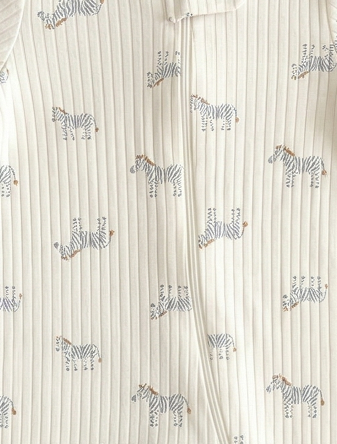 ZEBRA PATTERNED RIBBED WHITE SLEEPSUIT