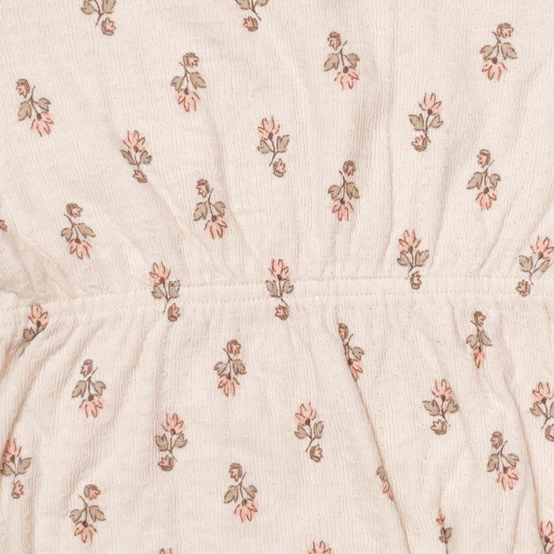 BEIGE RUFFLE EDGE NECK FLORAL ONESIE