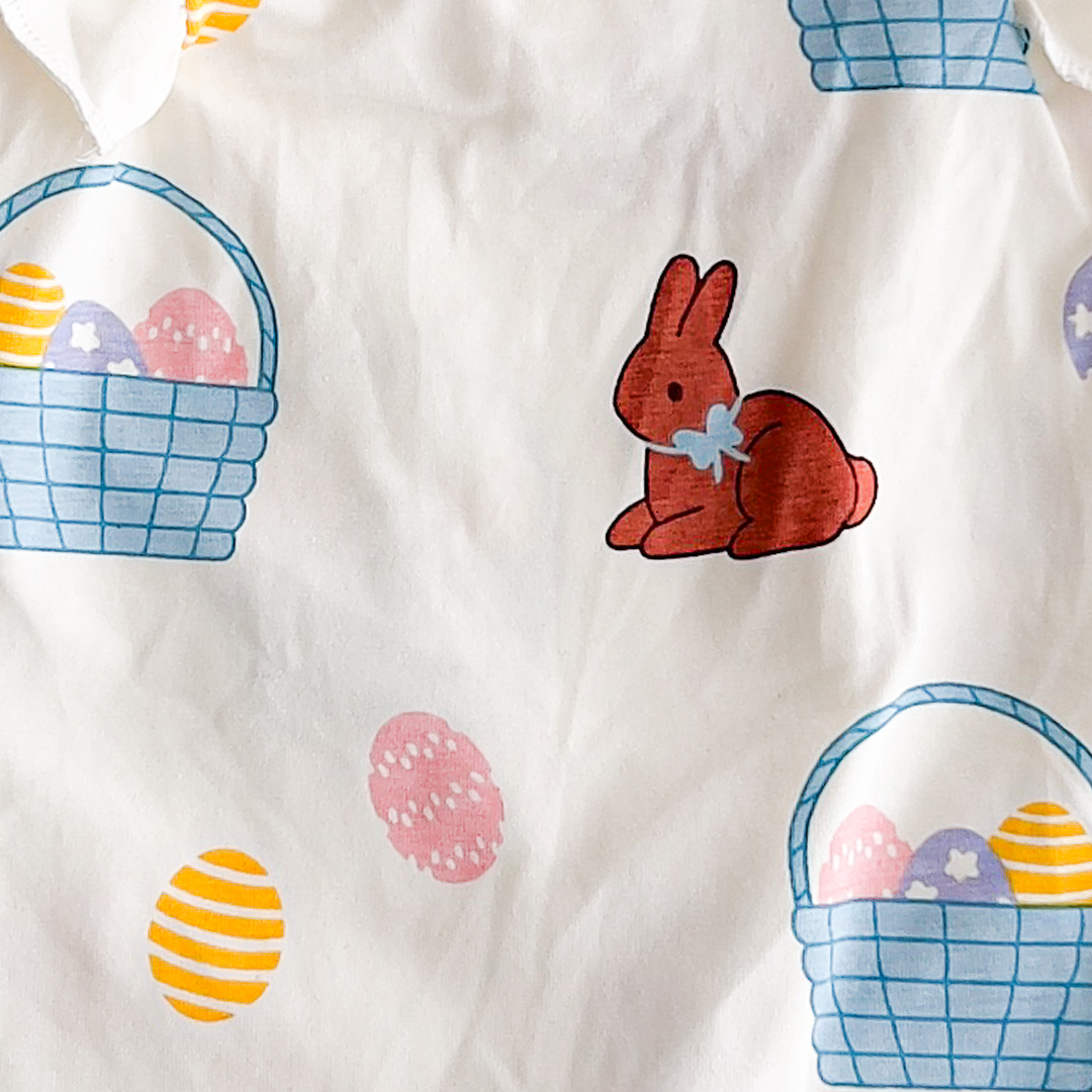 WHITE PRINTED RUFFLE ROMPER