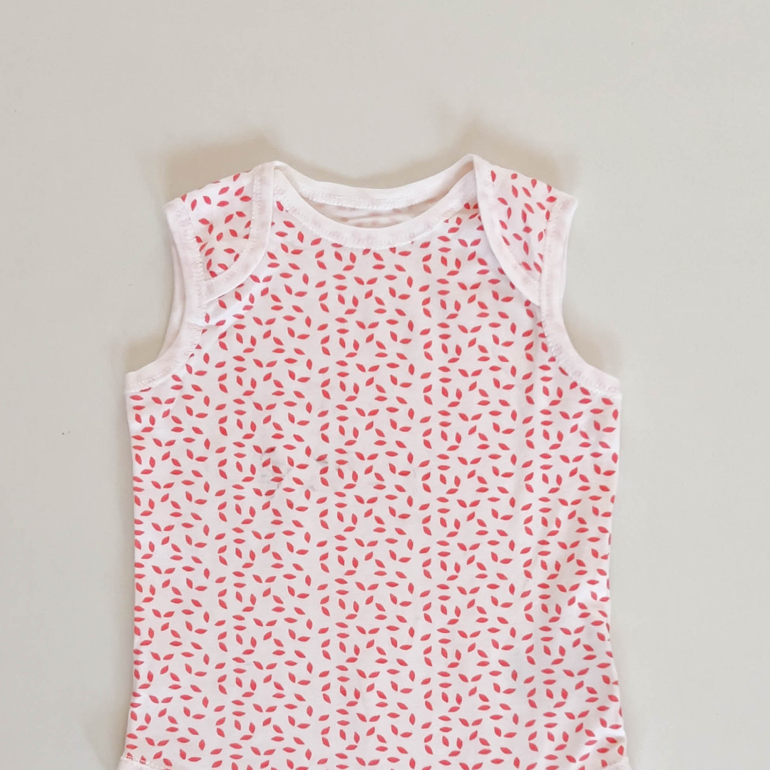 RED PATTERNED SLEEVLESS ONESIE
