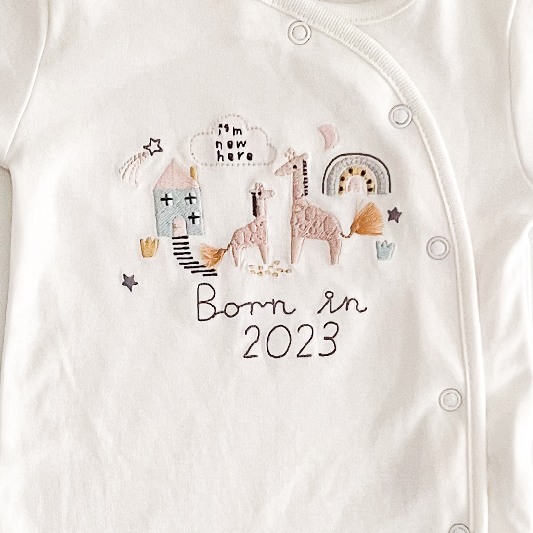 White born in 2023 sleepsuit